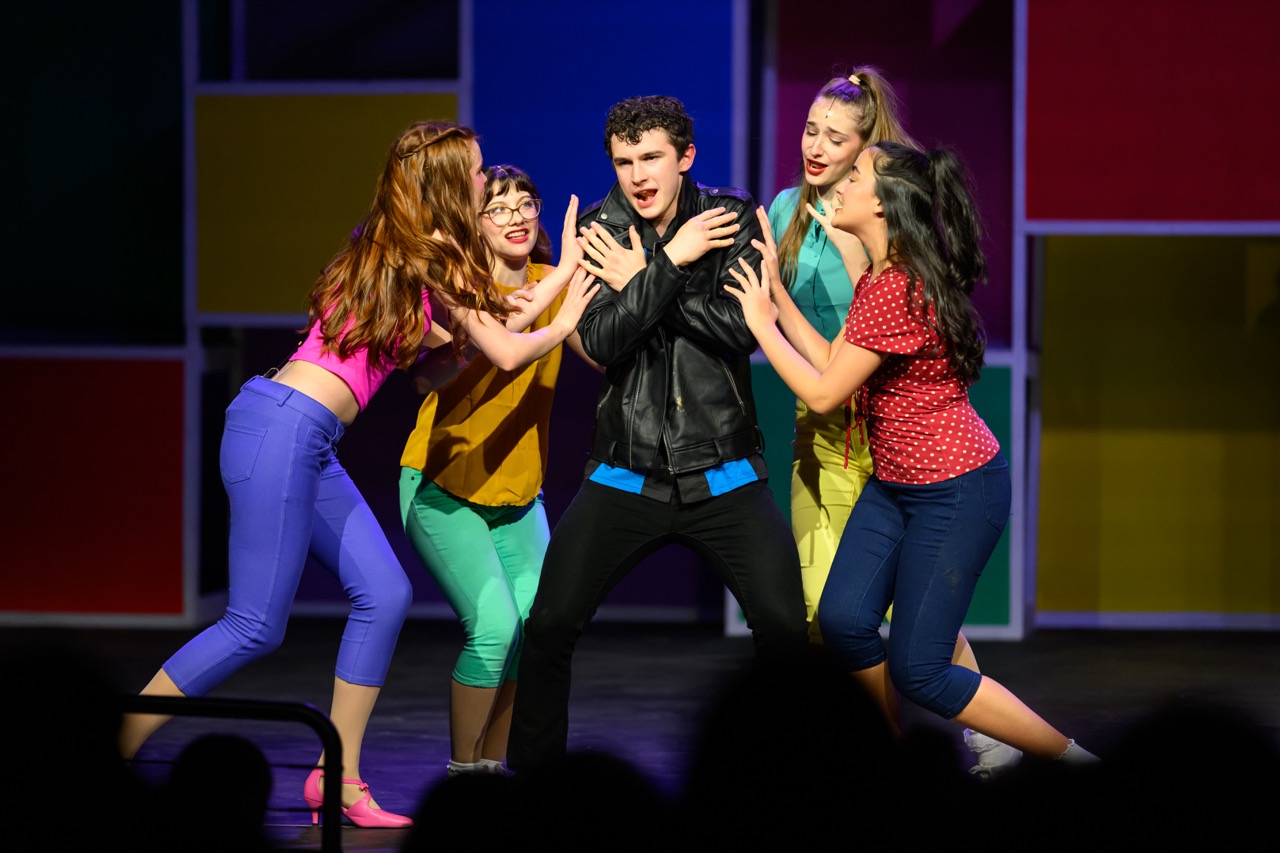 Students performing in Bye Bye Birdie